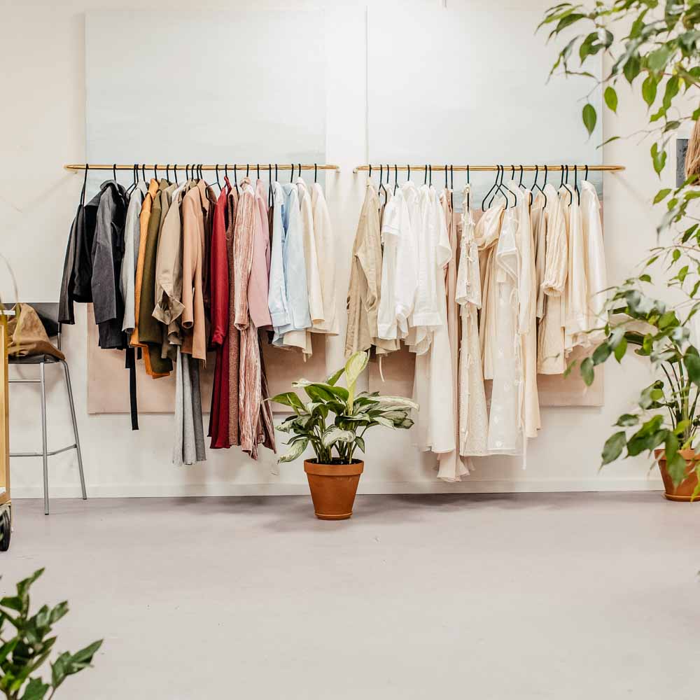 Clothing on a clothes rack.